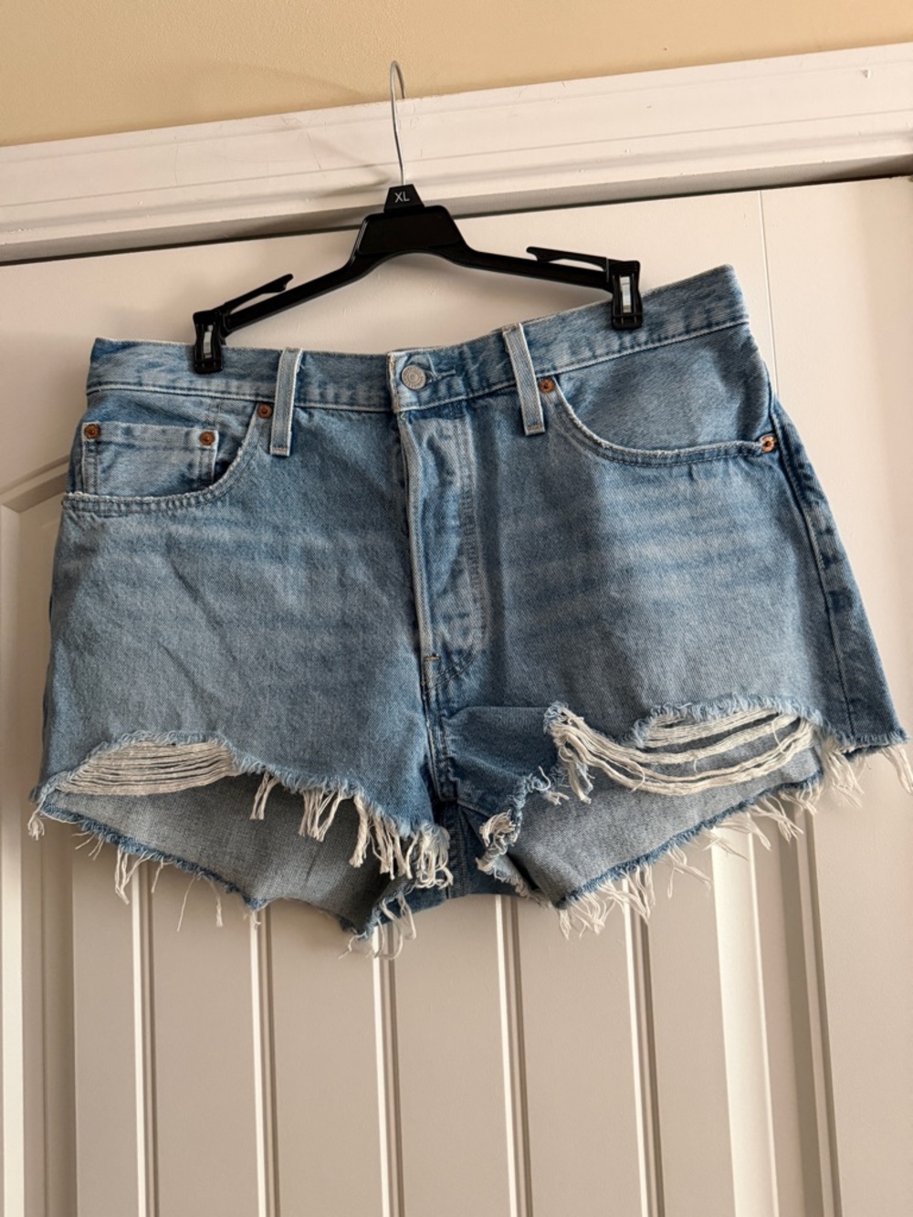 Levi’s 501 Light Blue Distressed Denim Shorts